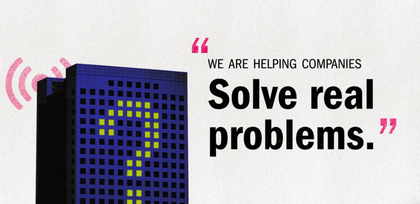 A graphic image of a building with the windows lit up in a "?" pattern to symbolize the more recently prevalent issue of facility capacity usage and how we monitor it. The graphic includes the quote "We are helping companies solve real problems."