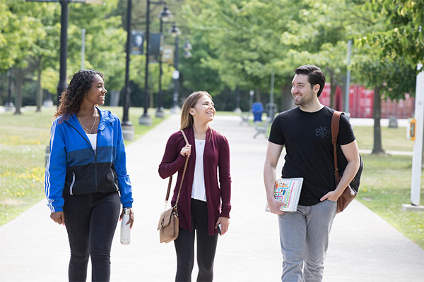 students walking through campus