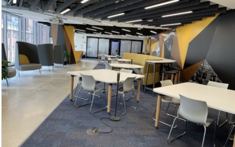 Learning commons room. Professional atmosphere, designed with a clean, contemporary aesthetic