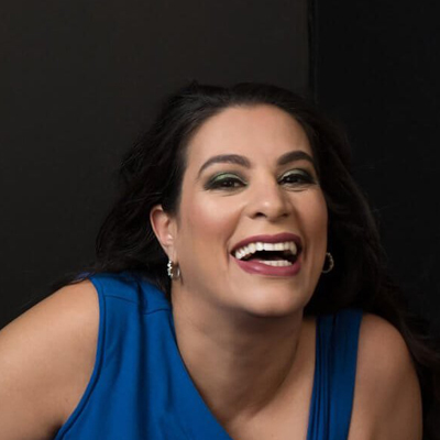 headshot of Maysoon Zayid.